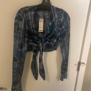 Cropped blue long sleeve sheer top
